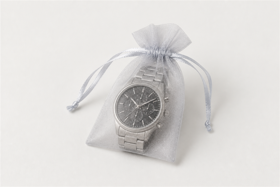 Men's watch presented in a sheer silver organza drawstring pouch