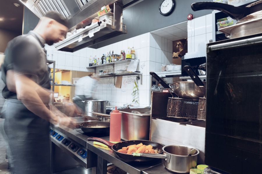 Restaurant team working through a busy dinner rush