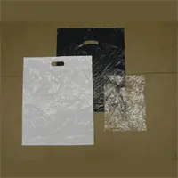 9W x 12L, 2 Mil Clear Low Density Die Cut Handle Bags